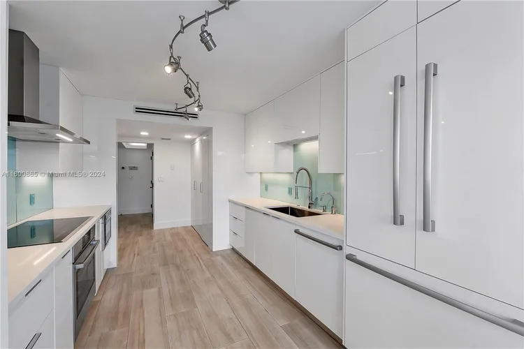 Three Grove Isle Condo #C202 image #12